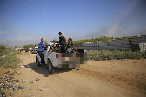 kidnapped daughter paraded half-naked by hamas|Photo of Hamas terrorists parading Shani Louk’s body wins top.